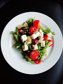 Delicious Greek salad featuring fresh vegetables and creamy feta cheese, perfect for a healthy meal.